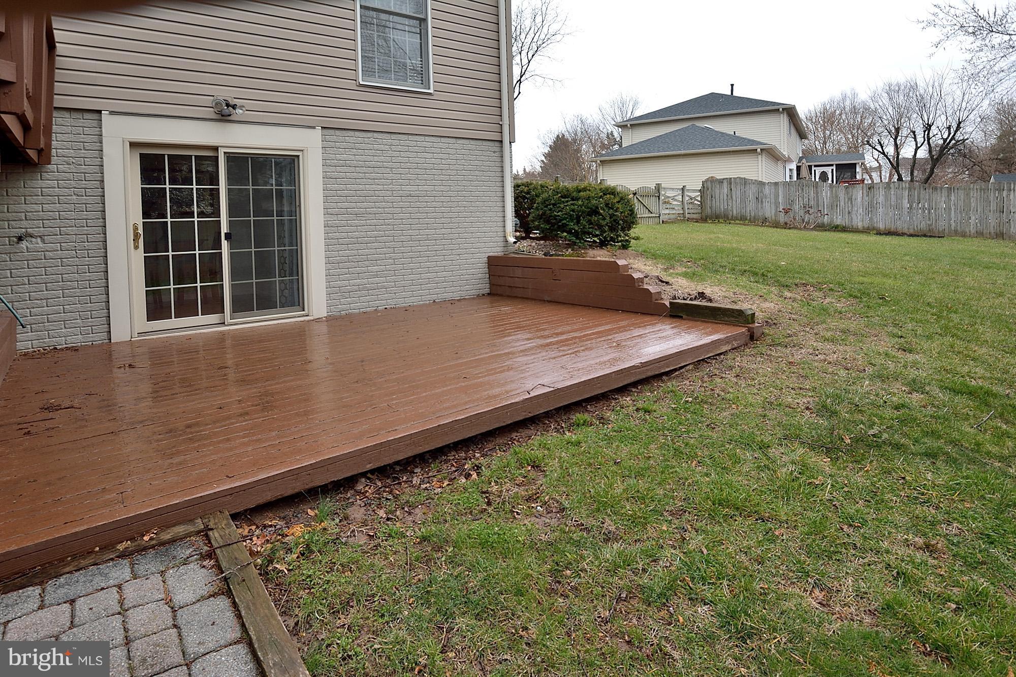 107 Rector Street Sterling, VA 20164 - Photo 29 of 29 Walkout onto lower deck from the rec room
