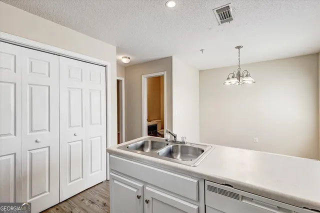 a bathroom with a sink and vanity