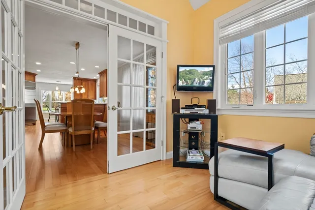 a bed room with a bed and a large window