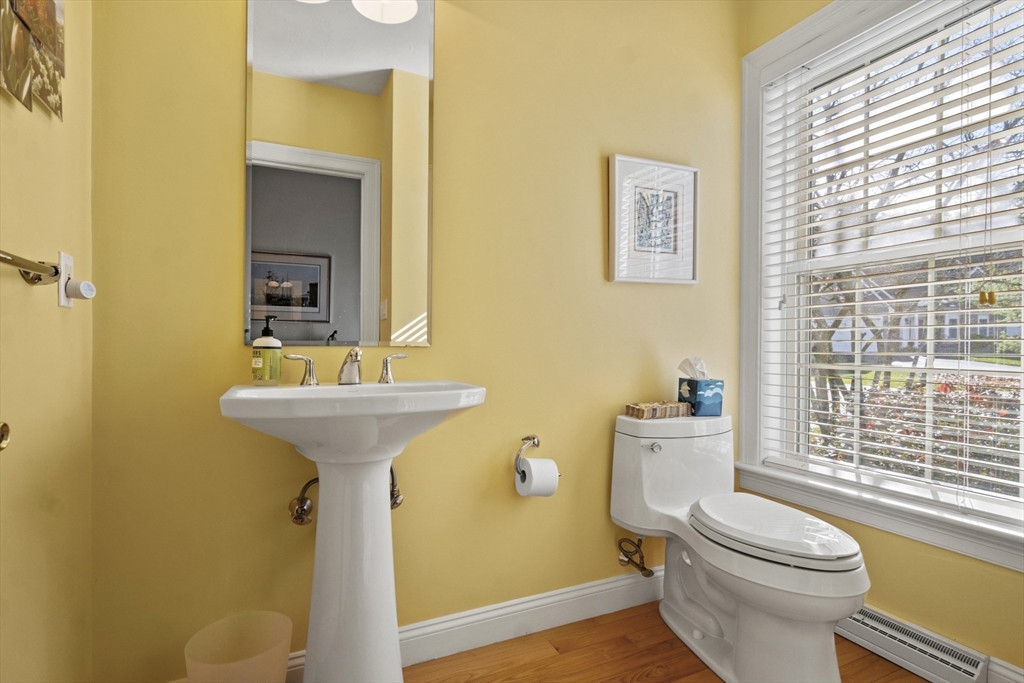36 Caldwell Farm Road, Unit 36 Newbury, MA 01922 - Photo 18 of 42 a bathroom with a sink toilet and mirror