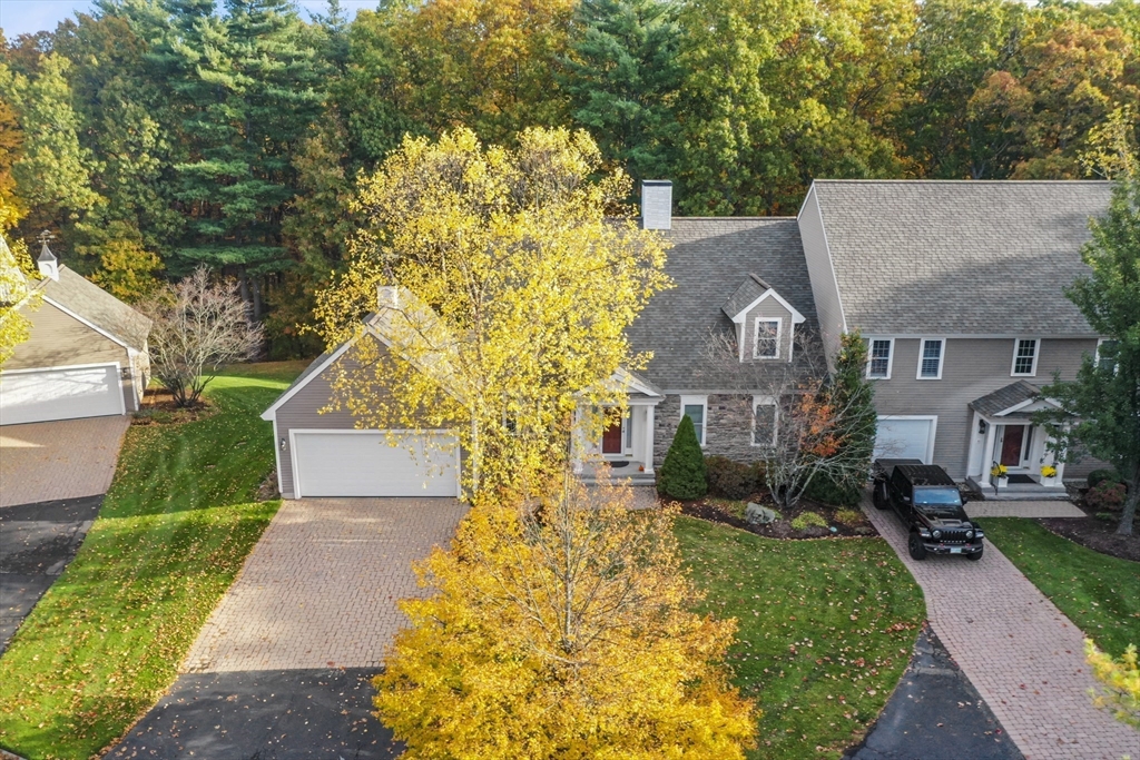 36 Caldwell Farm Road, Unit 36 Newbury, MA 01922 - Photo 3 of 42 a front view of a house with garden