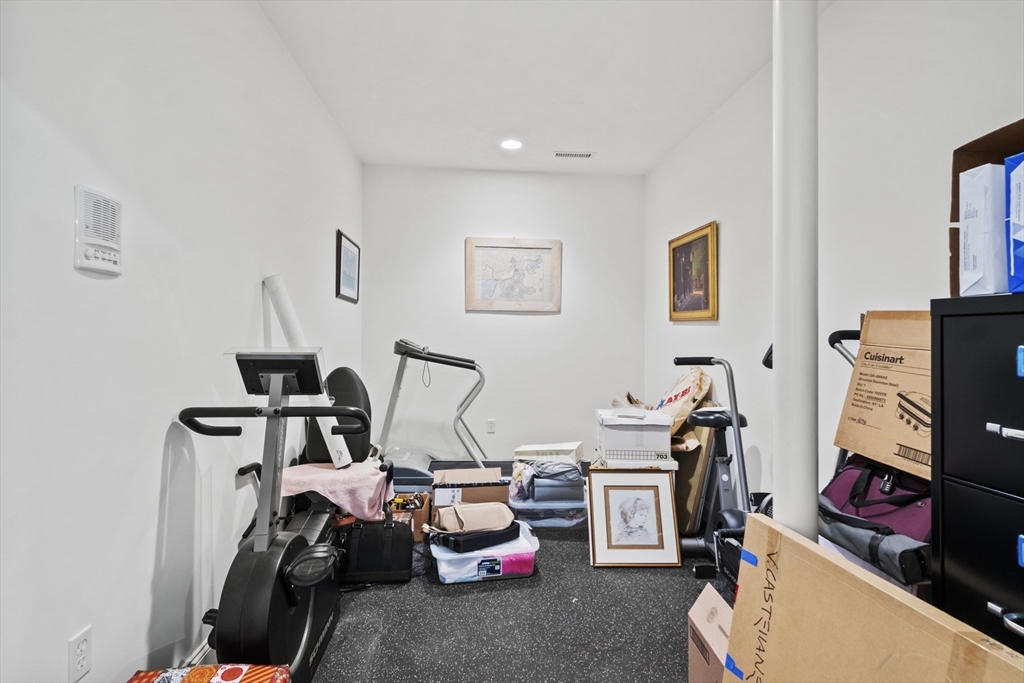 36 Caldwell Farm Road, Unit 36 Newbury, MA 01922 - Photo 35 of 42 a view of a room with gym equipment