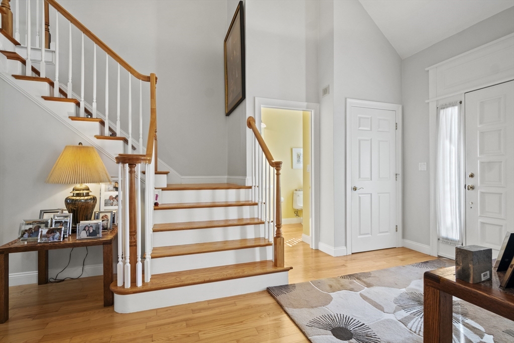 36 Caldwell Farm Road, Unit 36 Newbury, MA 01922 - Photo 6 of 42 a livingroom with wooden floor and furniture
