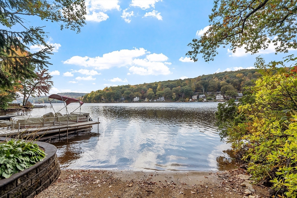 2 White Road Holland, MA 01521 - Photo 3 of 40 a view of a lake with a mountain