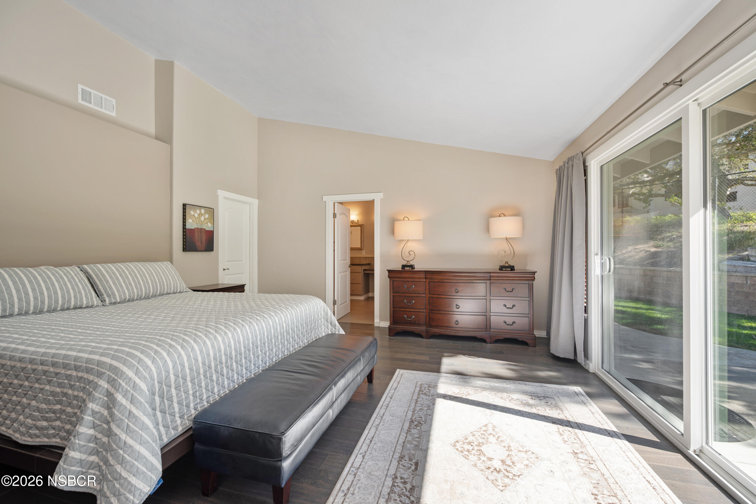 4473 Greenbrier Road Lompoc, CA 93436 - Photo 22 of 54 a bedroom with a bed and a large window