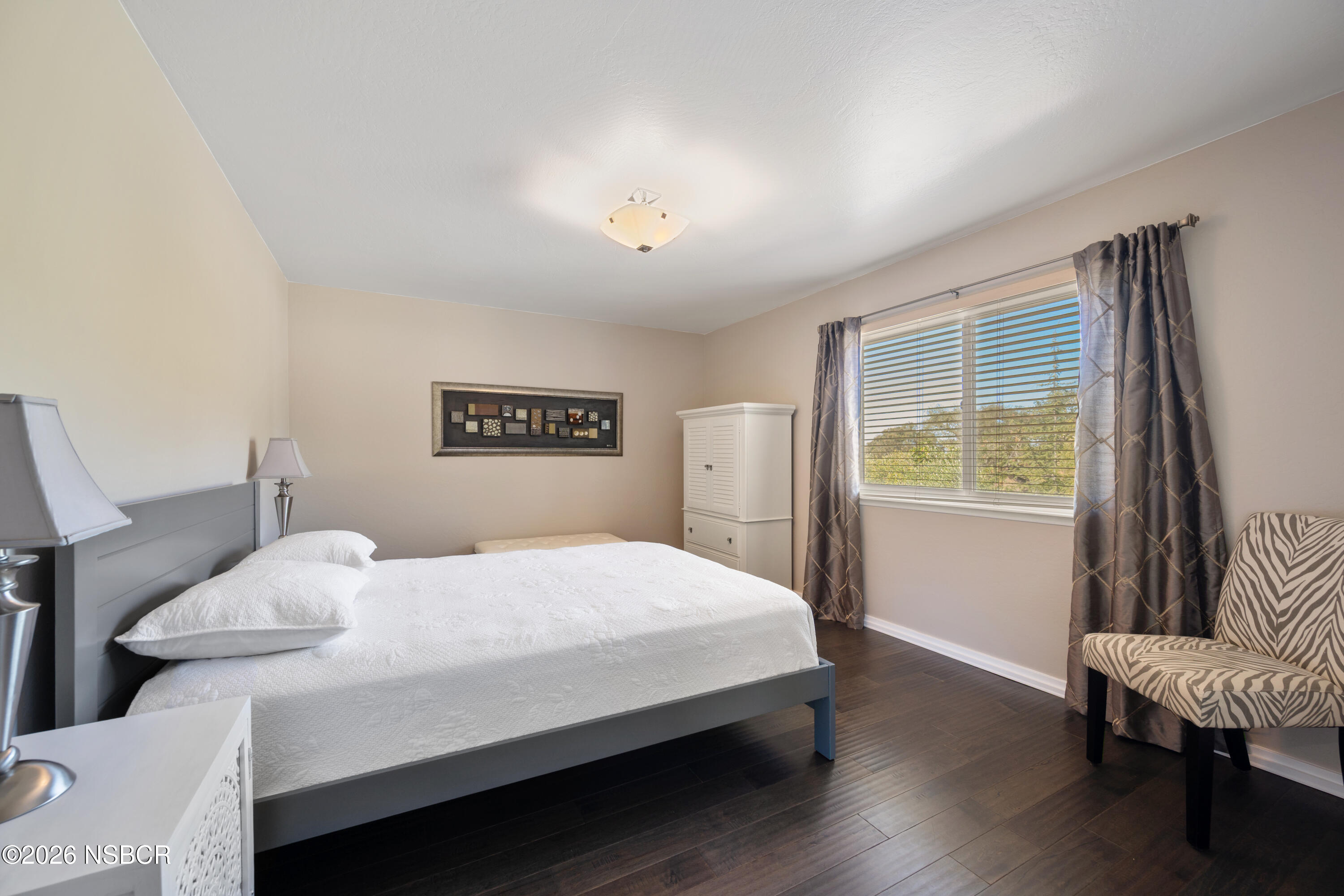 4473 Greenbrier Road Lompoc, CA 93436 - Photo 27 of 54 a bedroom with a bed and a window