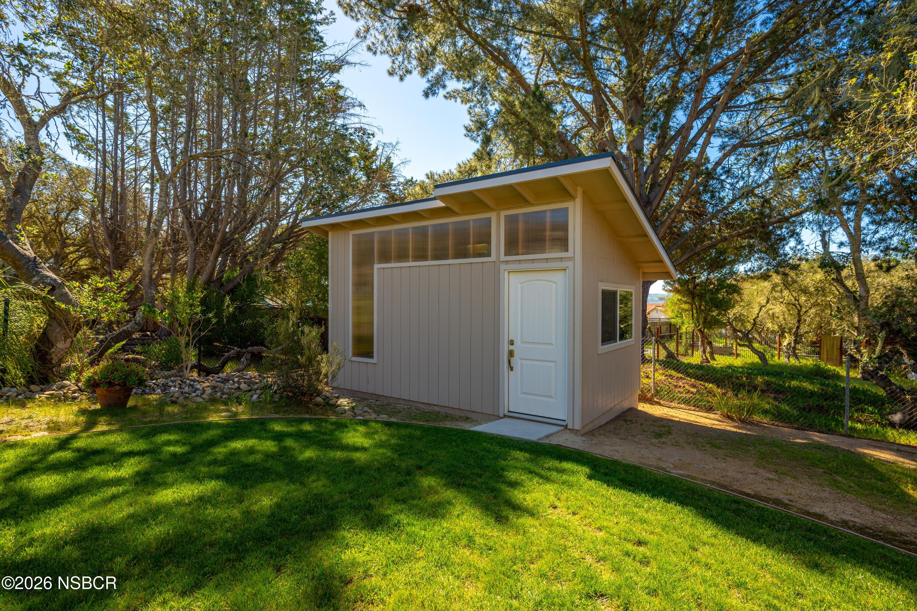 4473 Greenbrier Road Lompoc, CA 93436 - Photo 39 of 54 a front view of house with yard and trees around