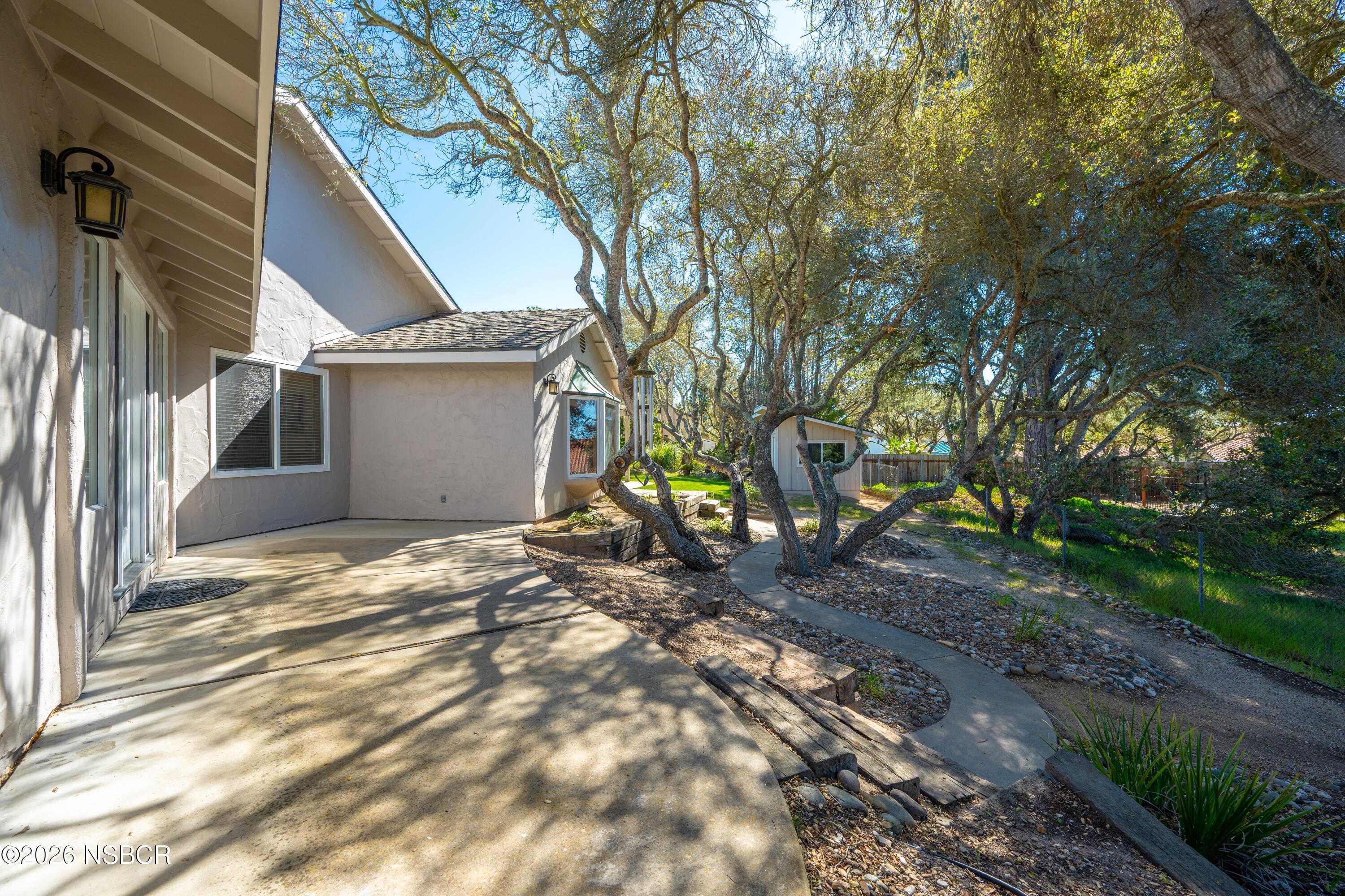 4473 Greenbrier Road Lompoc, CA 93436 - Photo 42 of 54 a backyard of a house with table and chairs
