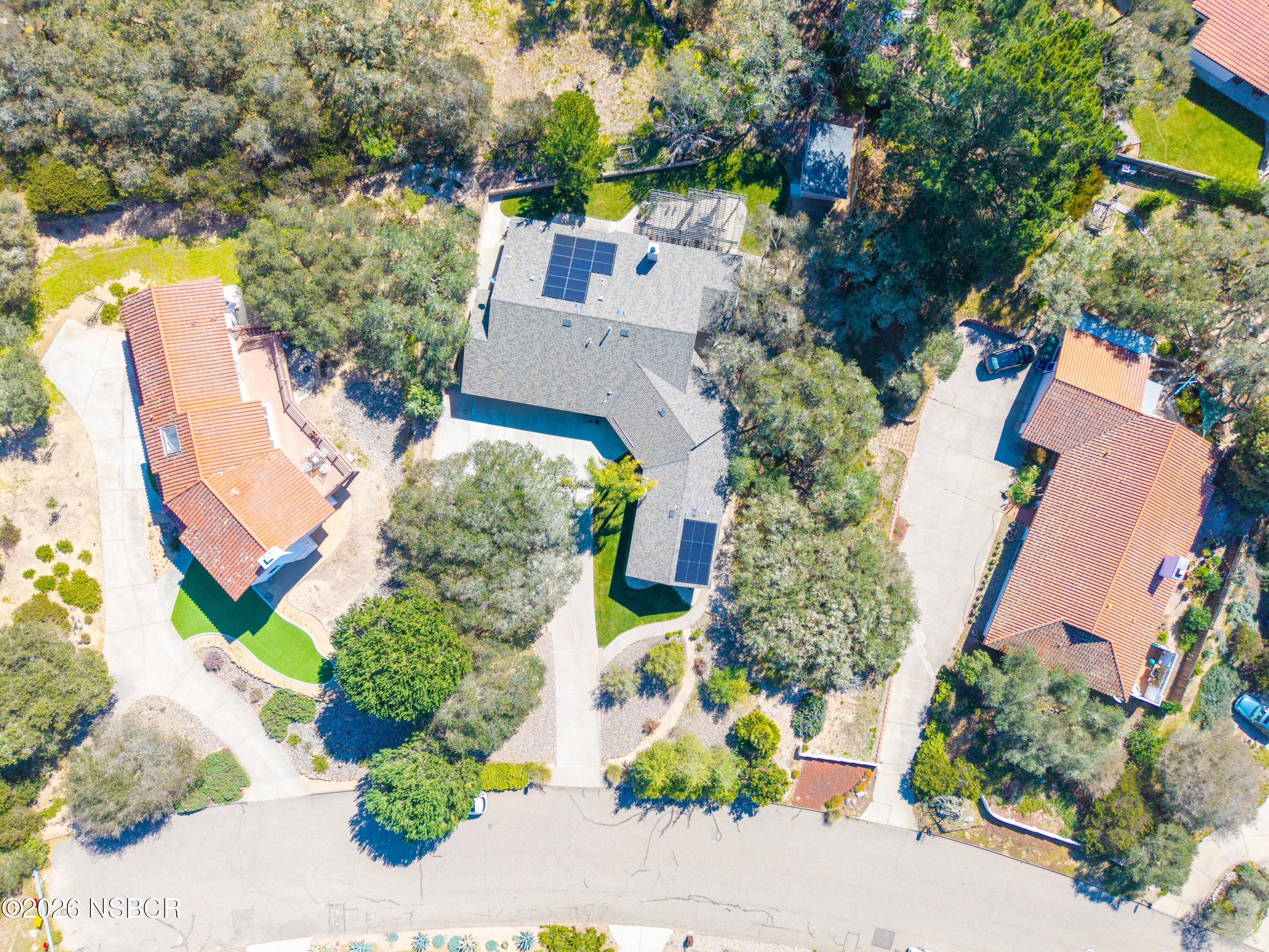4473 Greenbrier Road Lompoc, CA 93436 - Photo 46 of 54 an aerial view of a house with a yard and a large tree