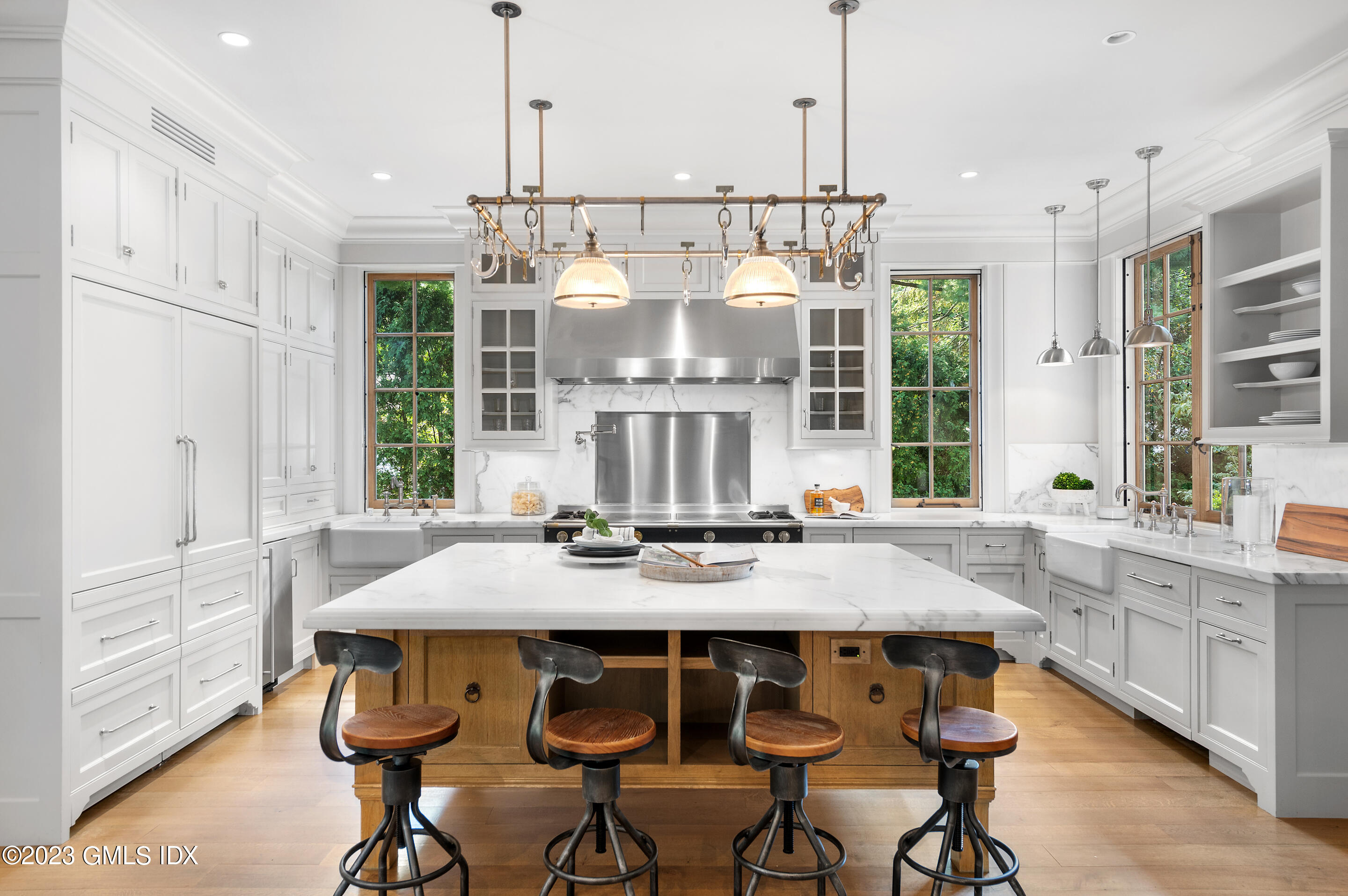 2 Martin Dale Greenwich, CT 06830 - Photo 13 of 53 a view of a dining table chairs and chandelier