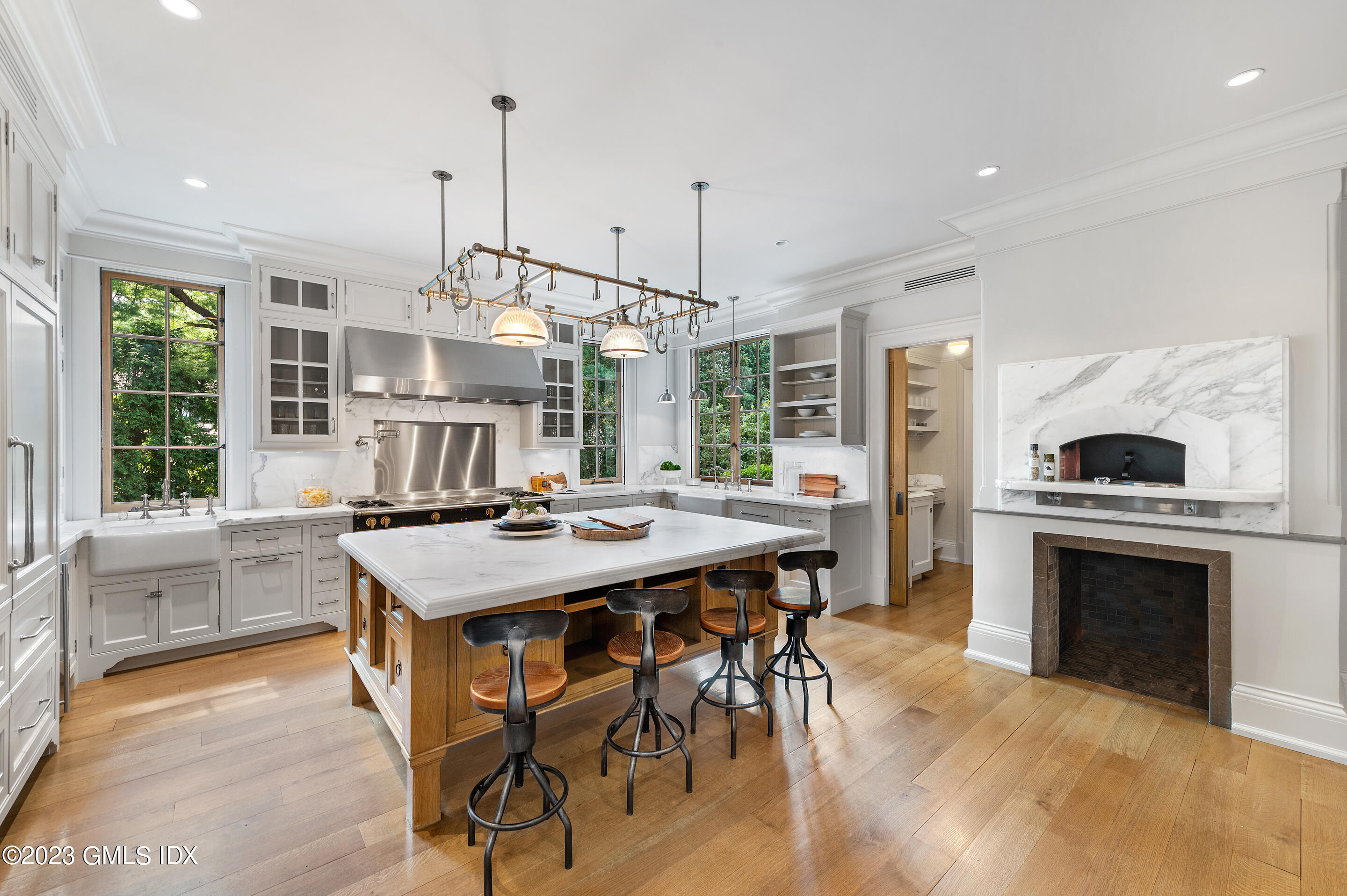 2 Martin Dale Greenwich, CT 06830 - Photo 14 of 53 a kitchen with stainless steel appliances granite countertop a stove and a refrigerator
