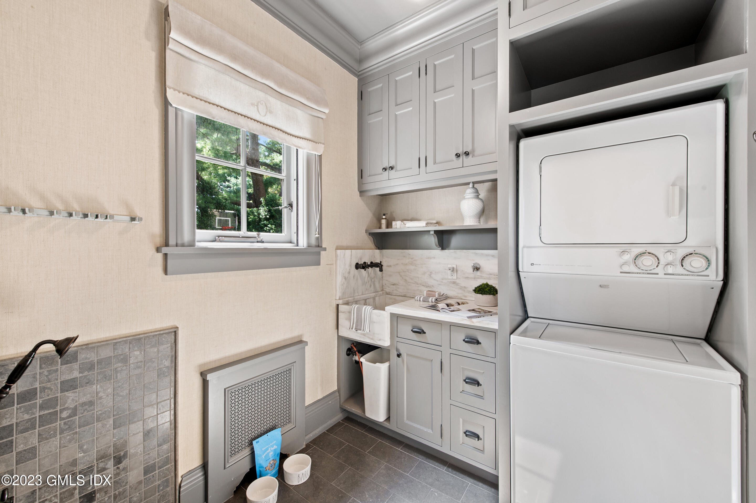 2 Martin Dale Greenwich, CT 06830 - Photo 39 of 53 a view of washer and dryer with kitchen in the background