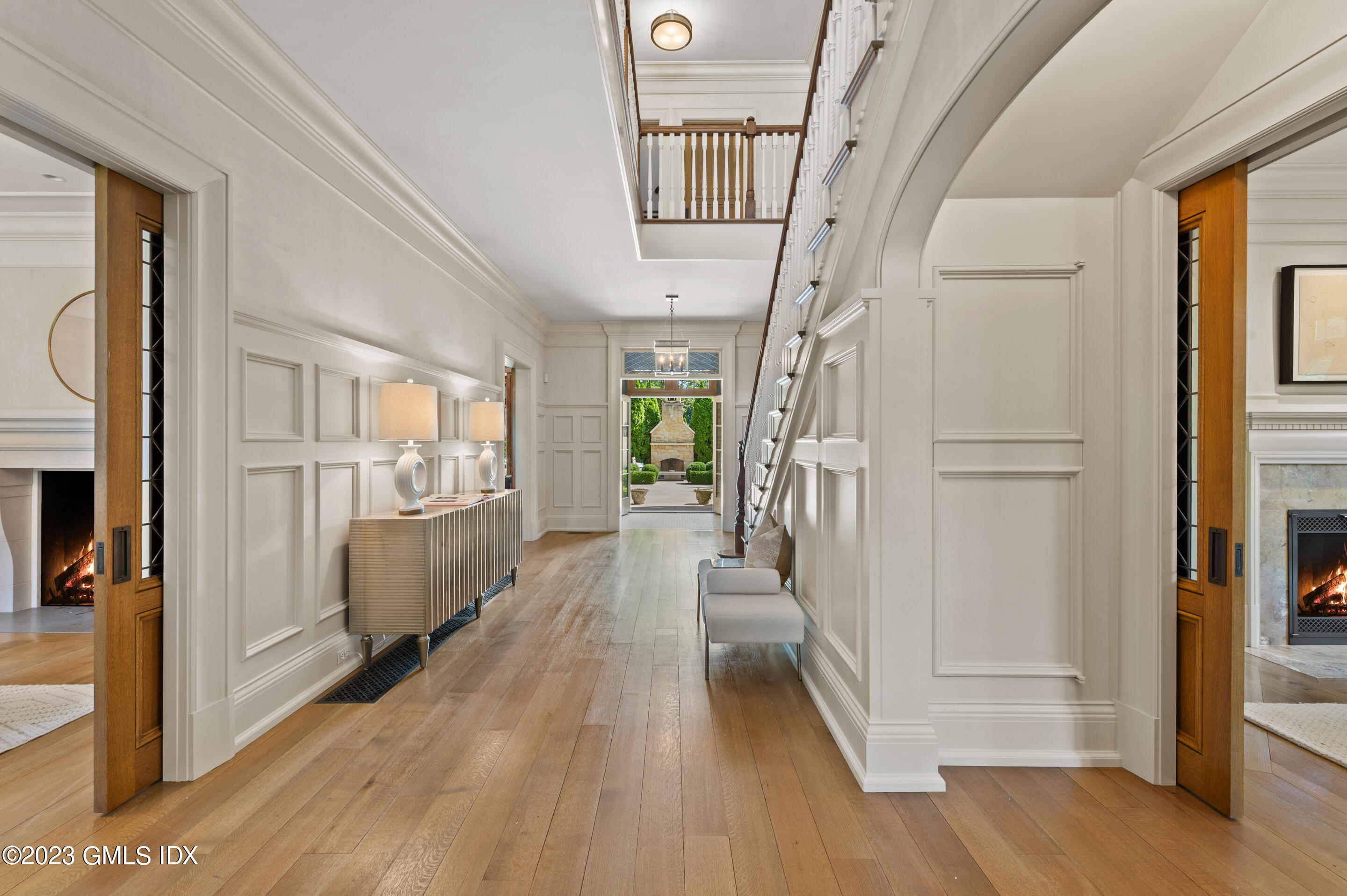 2 Martin Dale Greenwich, CT 06830 - Photo 4 of 53 a view of a hallway view with wooden floor and staircase