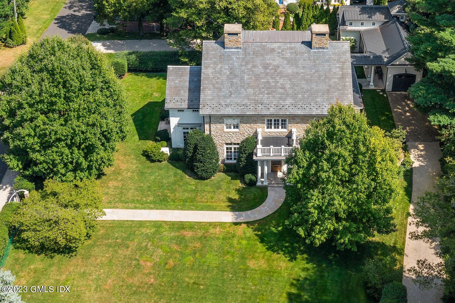 2 Martin Dale Greenwich, CT 06830 - Photo 52 of 53 an aerial view of a house with a garden and trees