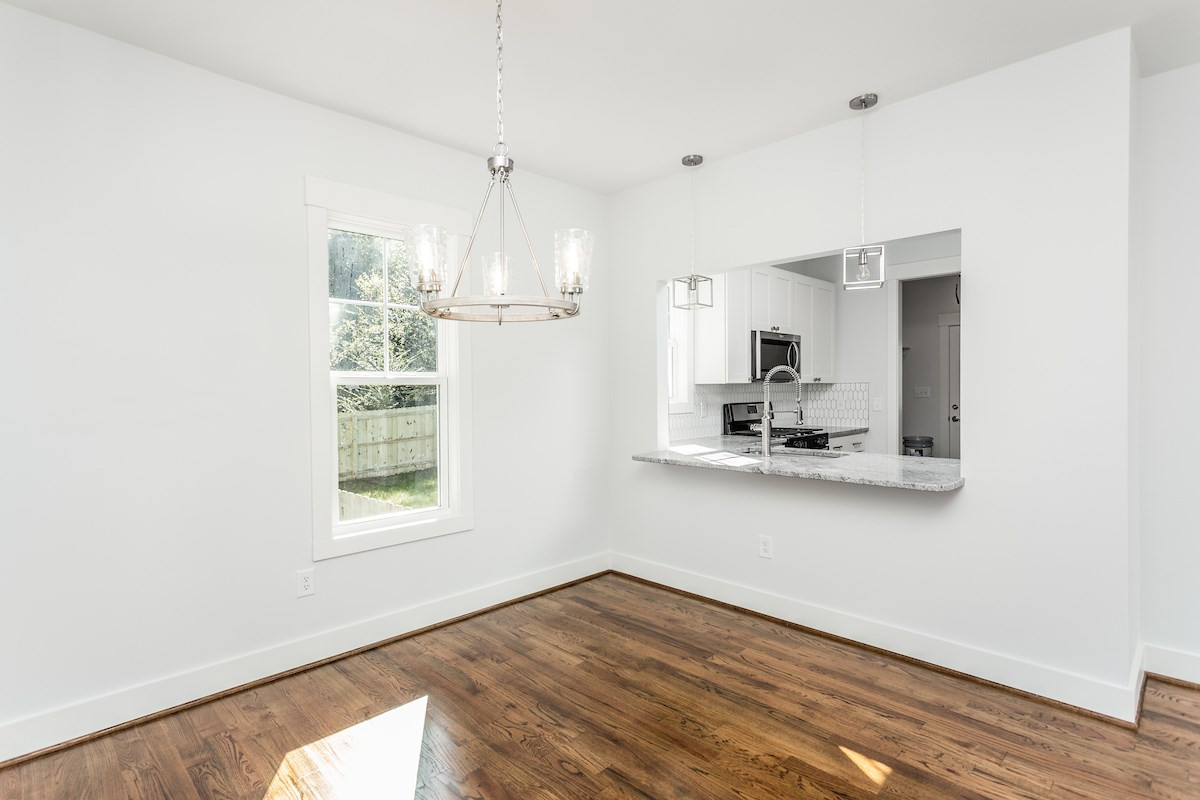 2700 Newbold Street Raleigh, NC 27603 - Photo 7 of 23 Pass-Through Window to Kitchen