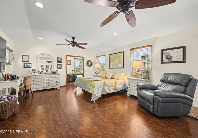 a dining room with furniture and windows