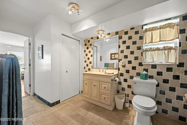 a view of a room with a table and chair