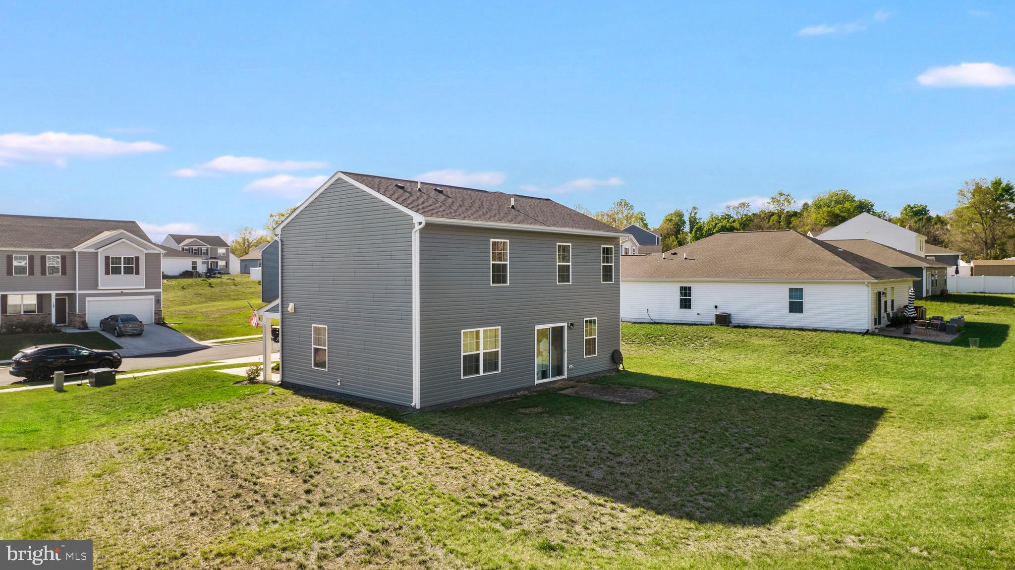 157 Lyon Rdg Road Shepherdstown, WV 25443 - Photo 27 of 28 a view of house with backyard outdoor seating and barbeque oven