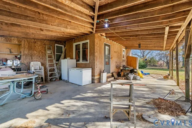 a view of a porch with furniture