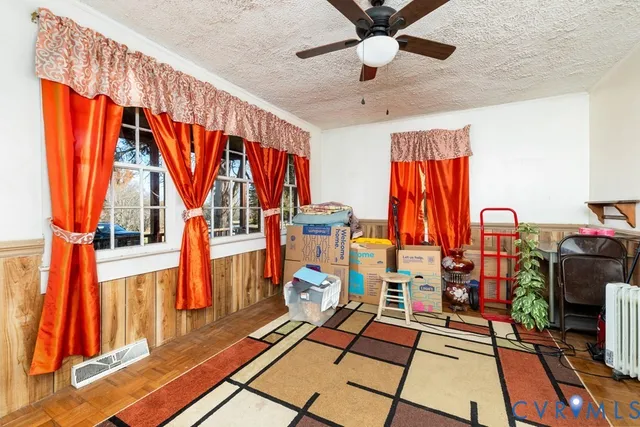 a view of gym equipment and front door