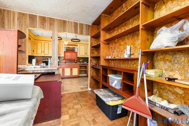a view of living room with furniture and window
