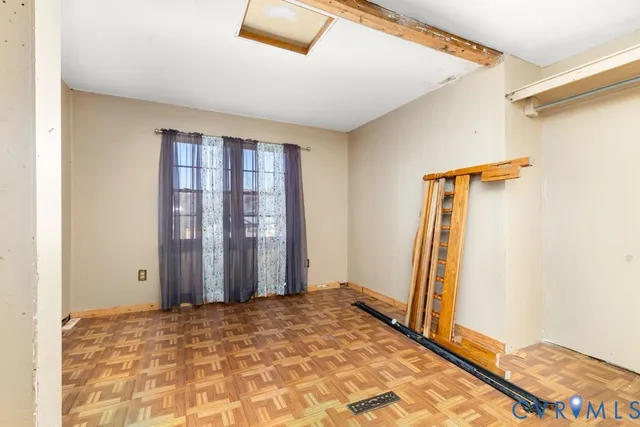 a view of a room with a wardrobe