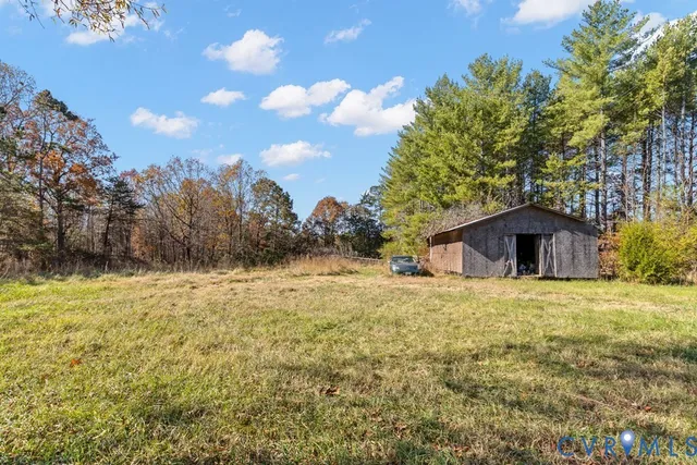a big room with trees in the background