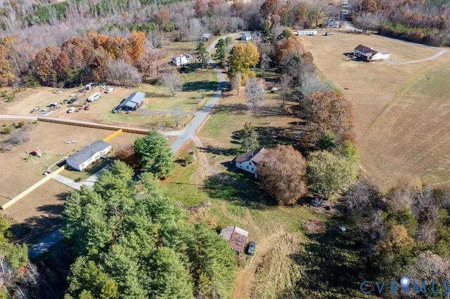 an aerial view of residential house with outdoor space