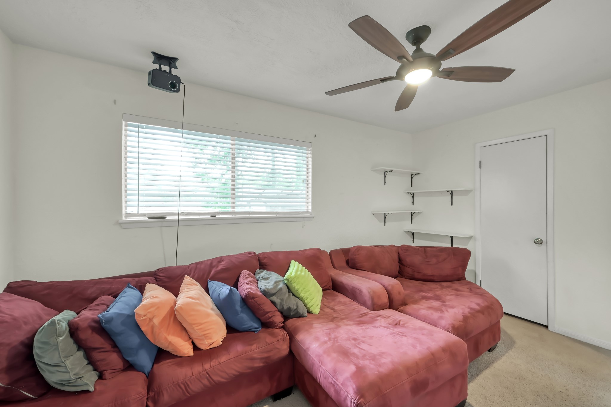 25610 Walnut Grove Circle Spring, TX 77380 - Photo 23 of 29 a living room with furniture and a window