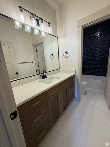 533 West S Temple Street, Unit 309 Tooele, UT 84074 - Photo 17 of 24 Full bath featuring vanity and bathtub / shower combination
