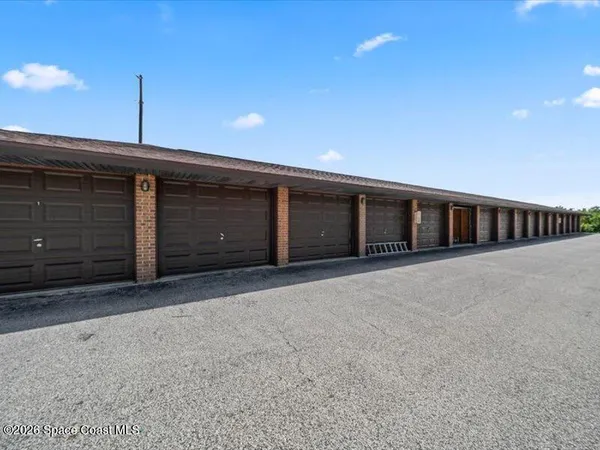 a view of a house with a garage