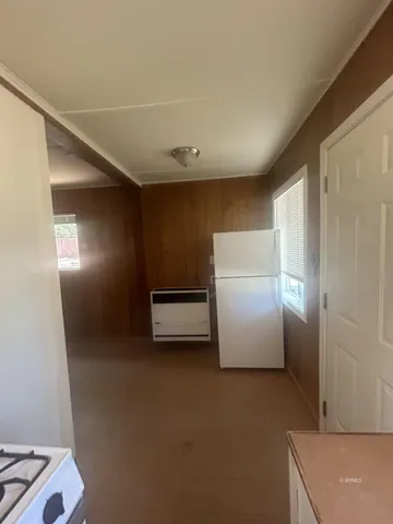 a view of a livingroom with a staircase