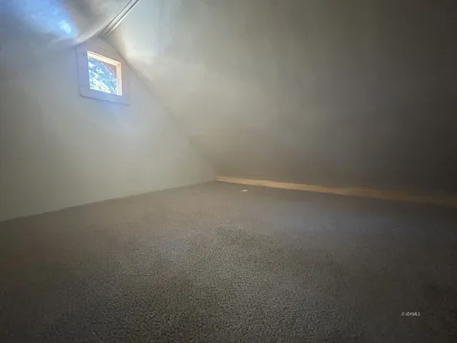 a living room with a fireplace