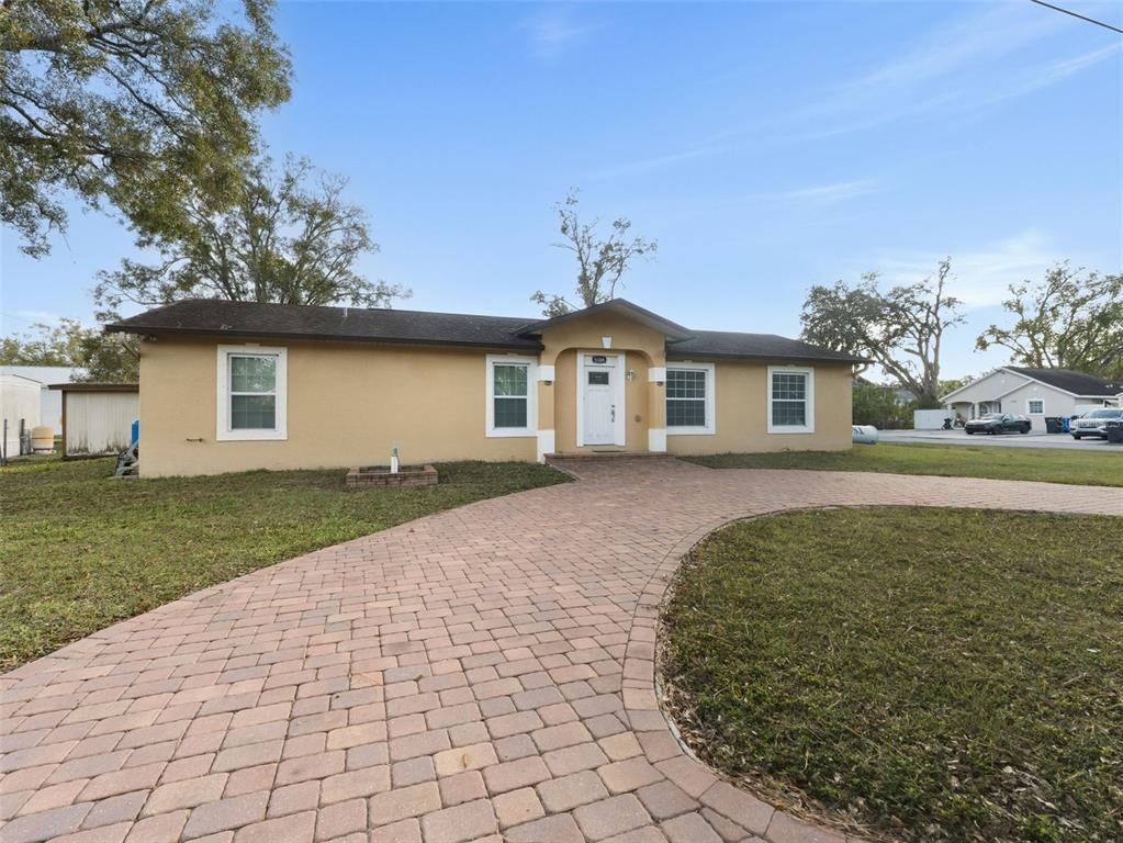 5104 Timberlan Street Tampa, FL 33624 - Photo 2 of 27 a view of house with outdoor space