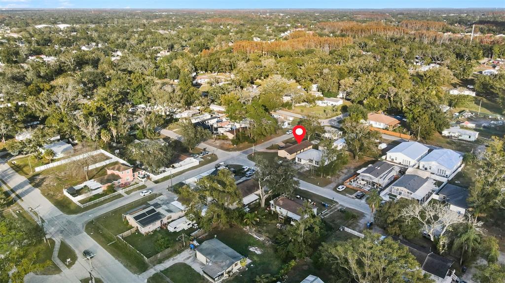 5104 Timberlan Street Tampa, FL 33624 - Photo 27 of 27 an aerial view of a city with lots of residential buildings