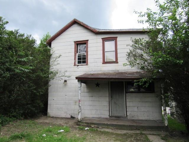 149 Coolspring Street Uniontown, PA 15401 - Photo 2 of 3 front view of a house with a small yard