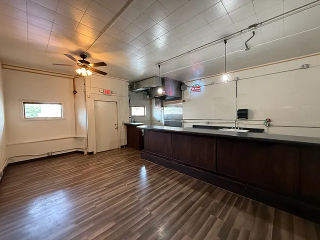 a view of a living room with a window