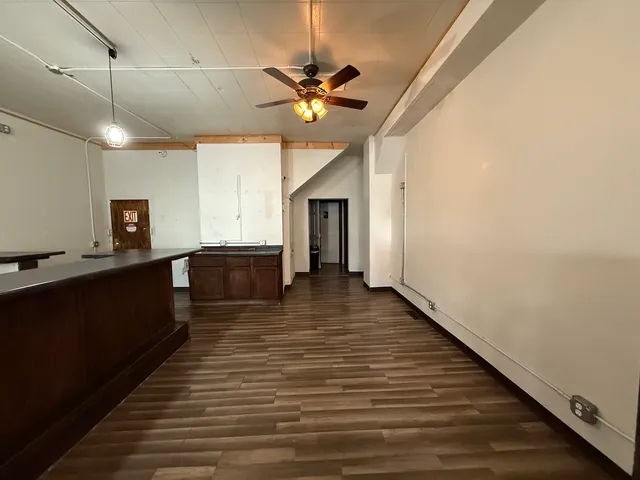 a view of a livingroom with a furniture