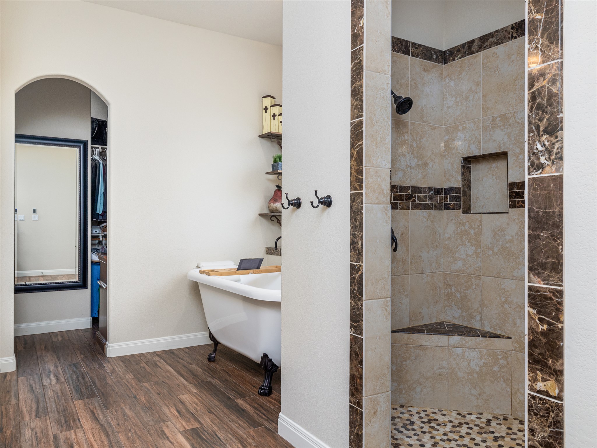 1316 Ranchers Club Lane Driftwood, TX 78619 - Photo 15 of 40 a bathroom with a bathtub and a shower