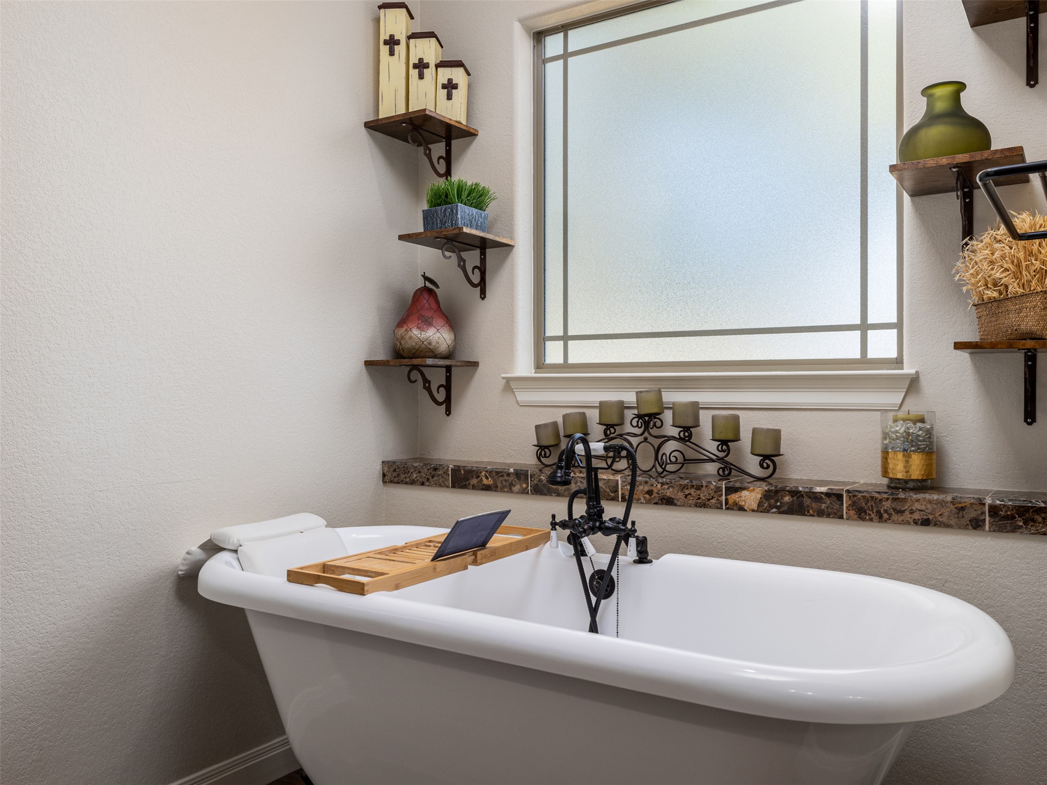 1316 Ranchers Club Lane Driftwood, TX 78619 - Photo 16 of 40 a bathroom with a sink and a bathtub