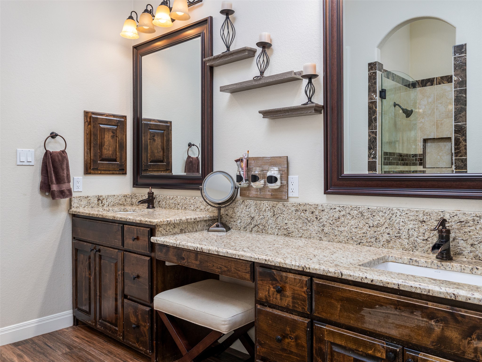 1316 Ranchers Club Lane Driftwood, TX 78619 - Photo 17 of 40 a bathroom with a sink and a mirror