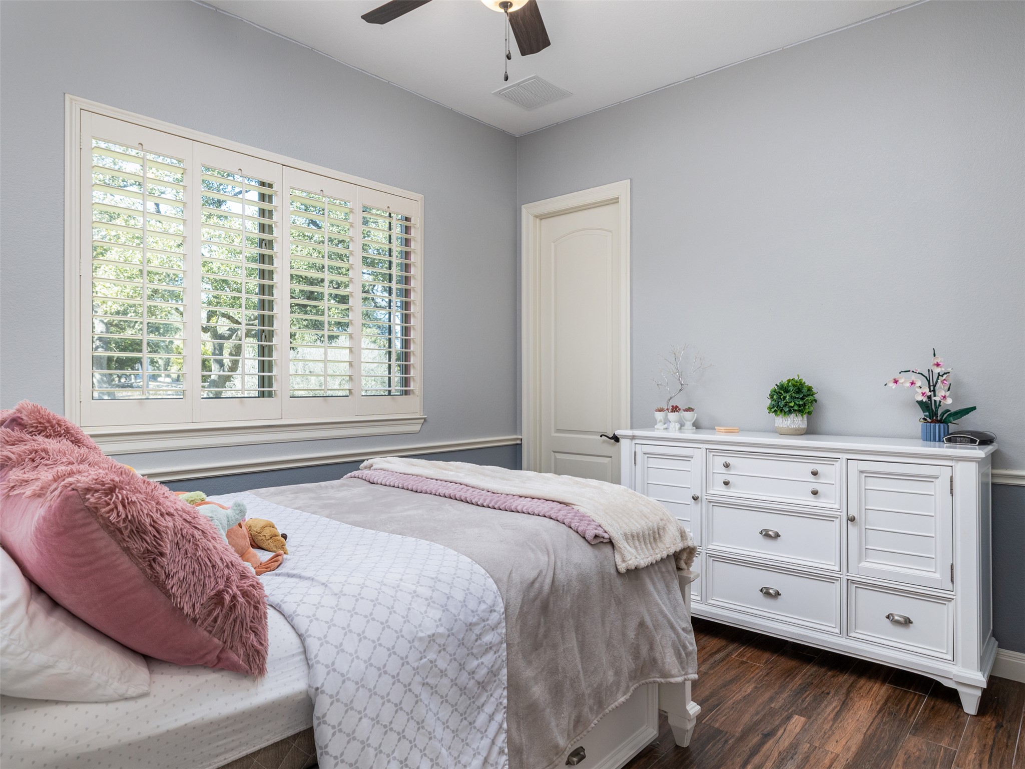 1316 Ranchers Club Lane Driftwood, TX 78619 - Photo 22 of 40 a bedroom with a bed and a window