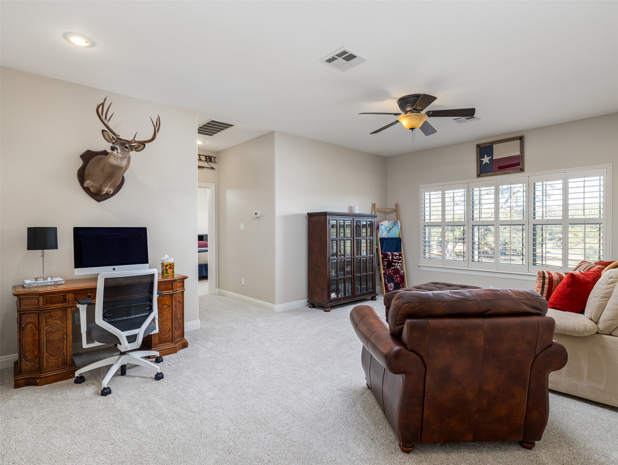 1316 Ranchers Club Lane Driftwood, TX 78619 - Photo 23 of 40 a view of a livingroom with workspace and a window