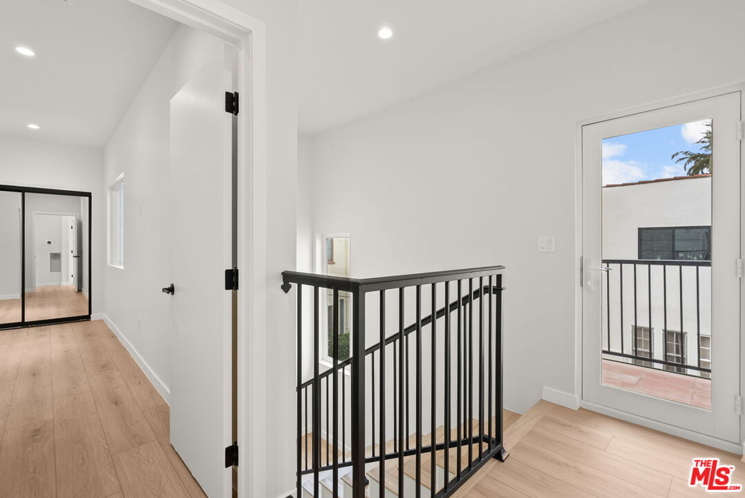 128 South Swall Drive, Unit 1/2 Los Angeles, CA 90048 - Photo 14 of 32 a view of a hallway with interior of the house