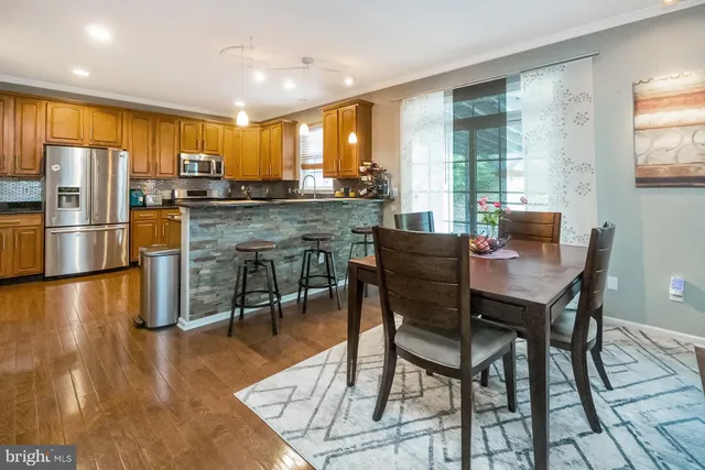 a view of a dining room with furniture