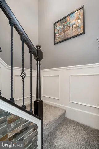 an entryway at livingroom with furniture and wooden floor