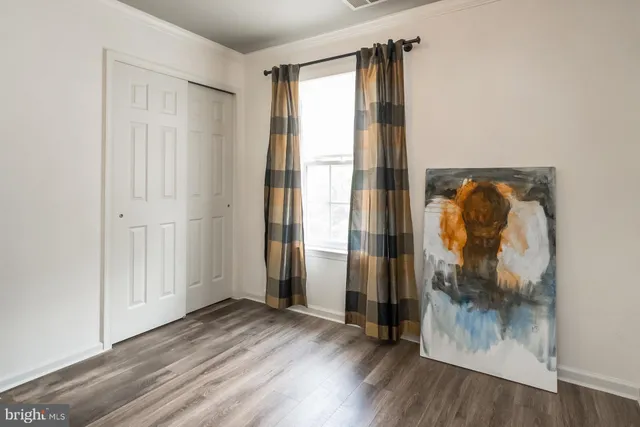 a bathroom with a toilet and a sink
