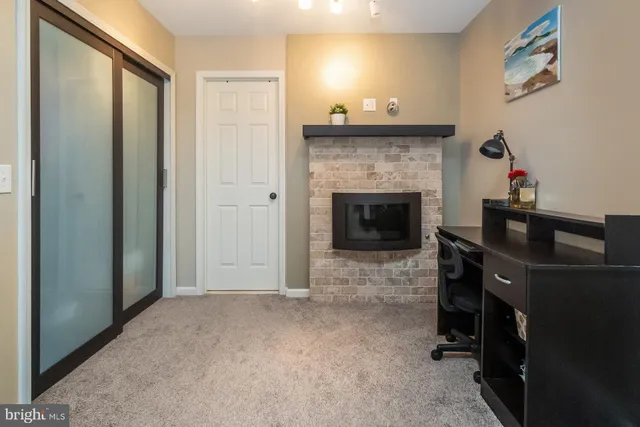 a view of a hallway with workspace