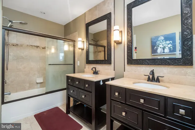 a view of a livingroom with furniture and staircase