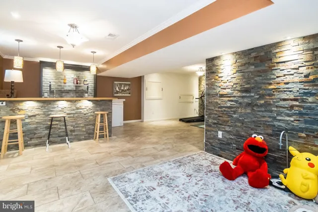 a backyard of a house with yard and trampoline